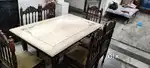Dining table with marble top