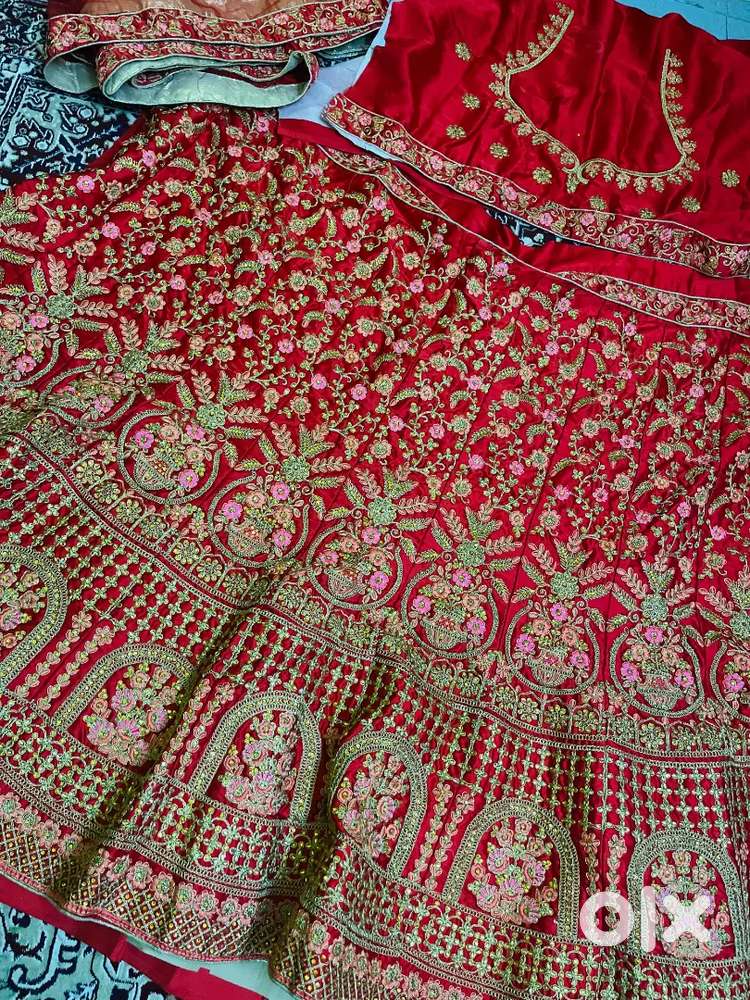 New red unstitched lehenga choli dupatta wedding wear , can can inside