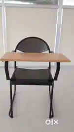Steel chair with writing pad