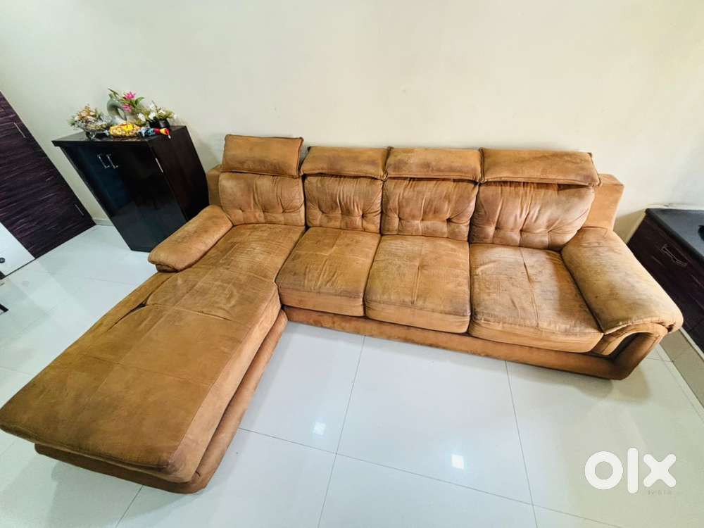 L Shaped brown sofa in rich brown color