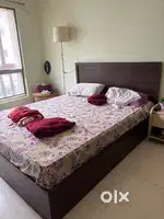 A queen size storage bed with mattress