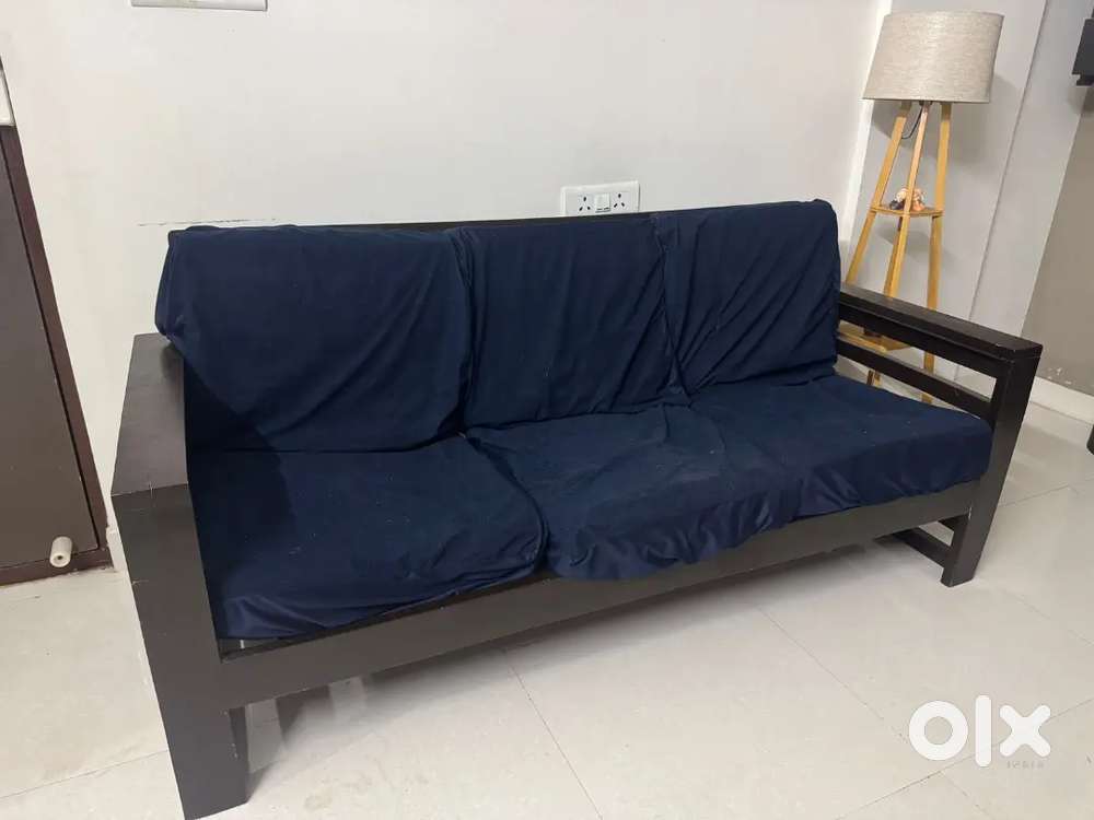 3 seater wooden sofa with sofa cover