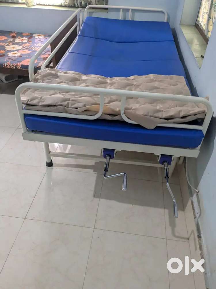 Blue cot , bed frame and mattress for sale