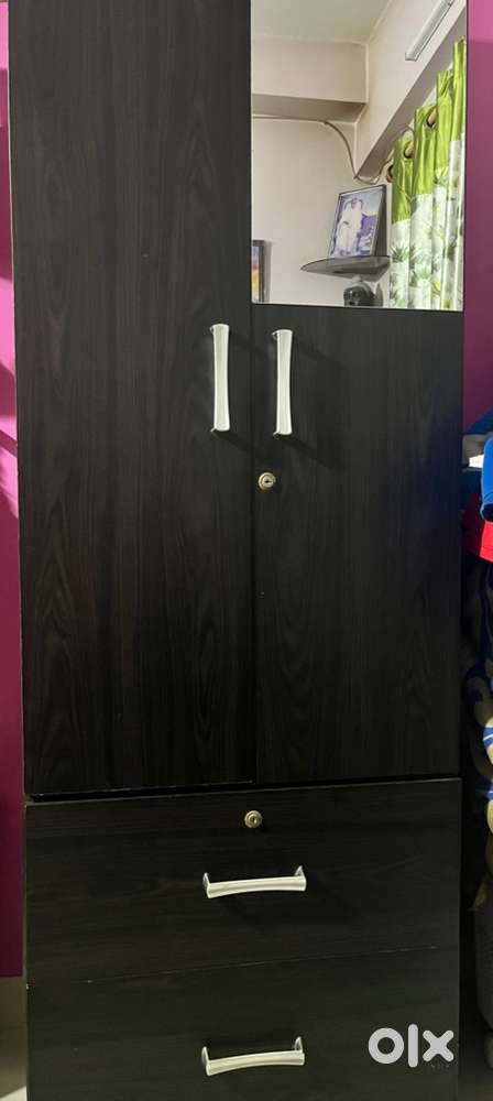 Wardrobe with mirror and drawer