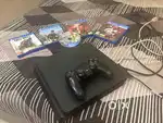 First hand PS4 500 GB with controller and 5 games