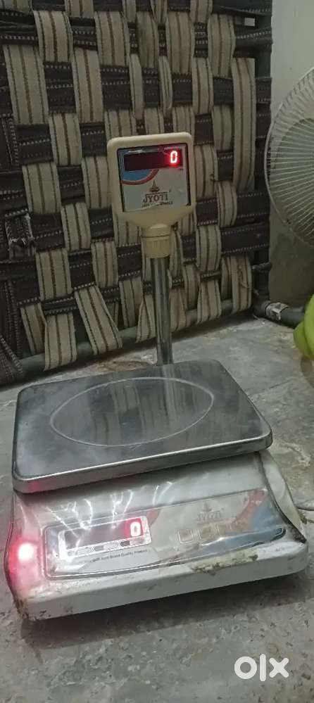 ELECTRONIC WEIGHTING MACHINE