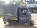Ice cube delivery and 3 wheel goods vehicle driver
