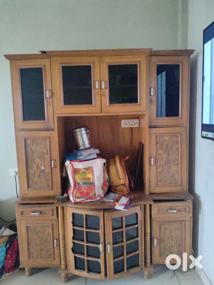 Tv unit with wooden cabinets for storage