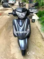 Suzuki Swish 125 cc in a good condition in grey colour.