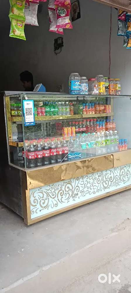 Display fridge, Wooden Rack, Motor Mosaumi juice machine, Counter
