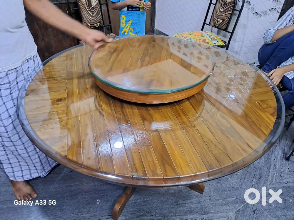 Woodern dining table with center dish table rotation