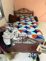 Bed and cupboard