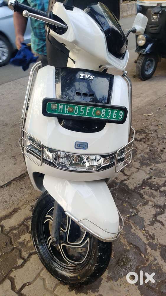 Ladies driven vehicle, well maintained condition top, white color