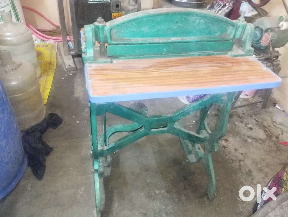 Wooden table ,foot operated casting perforation machine