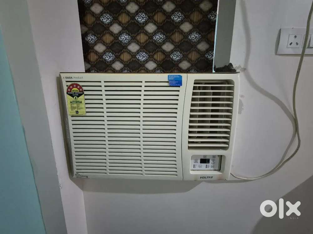 Voltas 5 star less used window AC