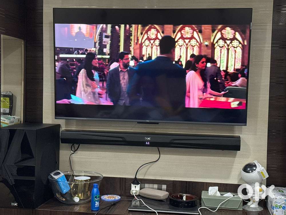 6-7 Months TCL TV 108cm(43 inches), TV stand and Soundbar and woofer