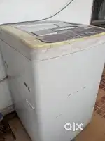 LG top load washing machine with company stand