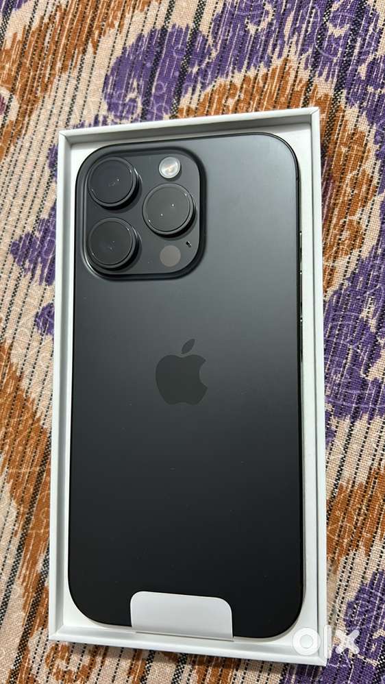 Iphone 16 pro black new with 1 year apple waranty