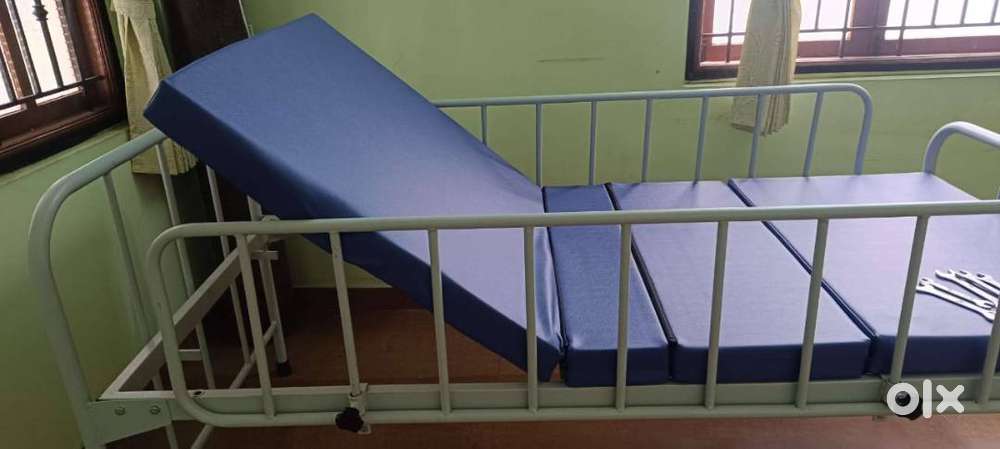 Hospital bed (Adjustable patient bed with side rails)