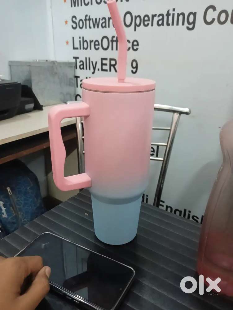 Stylish pink and blue sipper with straw
