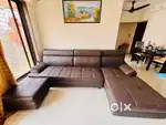 L Shape brand new hand made 3 to 4 year old leather sofa with 1 puffy.