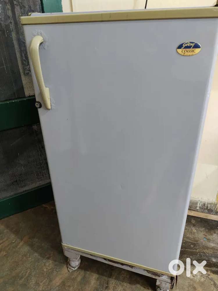 Godrej Fridge in working condition with stand