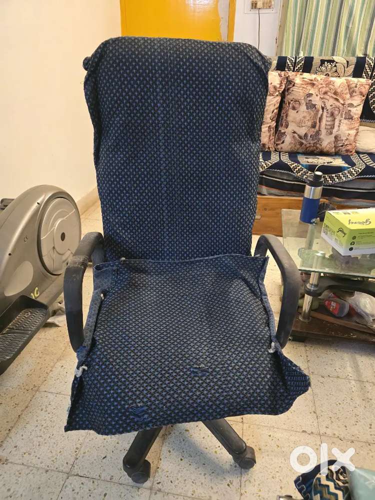 Revolving chair with high backrest and cover