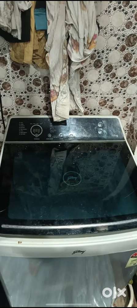 Automatic washing machine2years guarante1years old ok bil new condish.