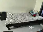Single wooden bed