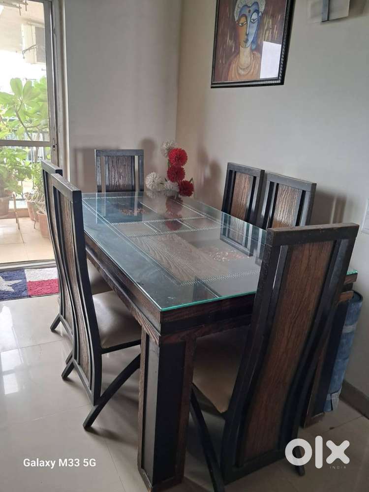 Six seater dining table with chairs and Mandir