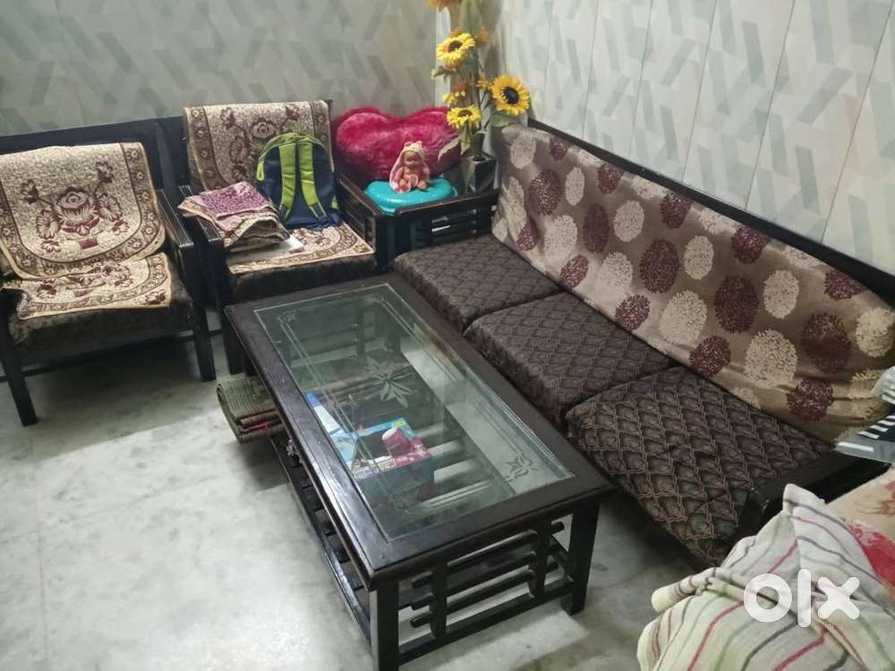 Wooden sofa set with table