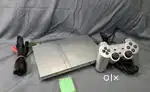 Ps2 with 2 controllers and 4 cd