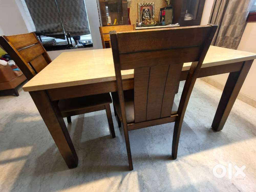 6 seater Malaysian wood Dining table+ 3 chairs for sale