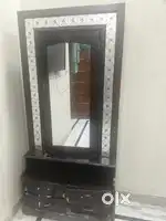 We are selling our wooden dressing mirror