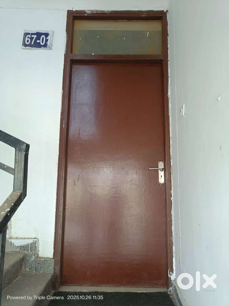 Three sided balcony and green lush open area