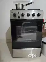 Gas stove with oven and tandoor
