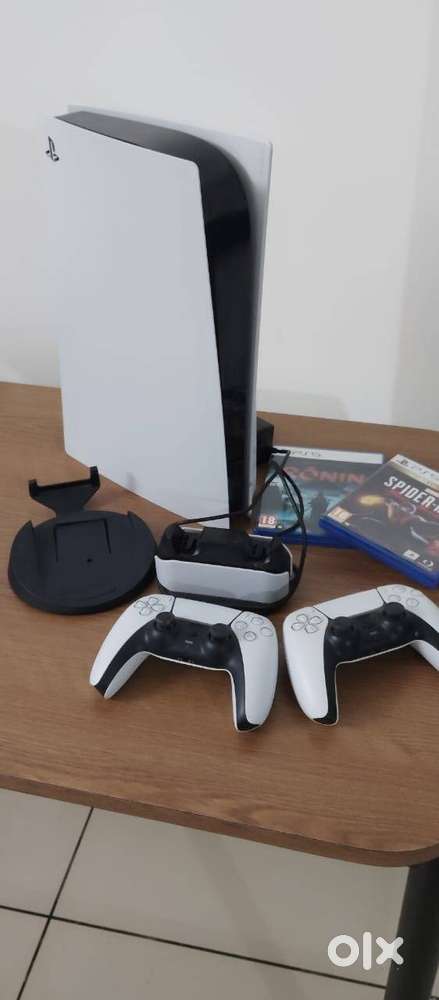 PlayStation 5 Slim (1TB) with 2 Controllers + Charging Dock + 2 Games