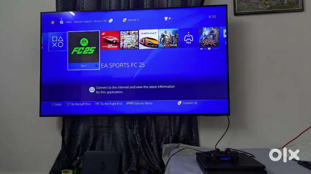 PS4 SLIM 1TB WITH A CONTROLLER