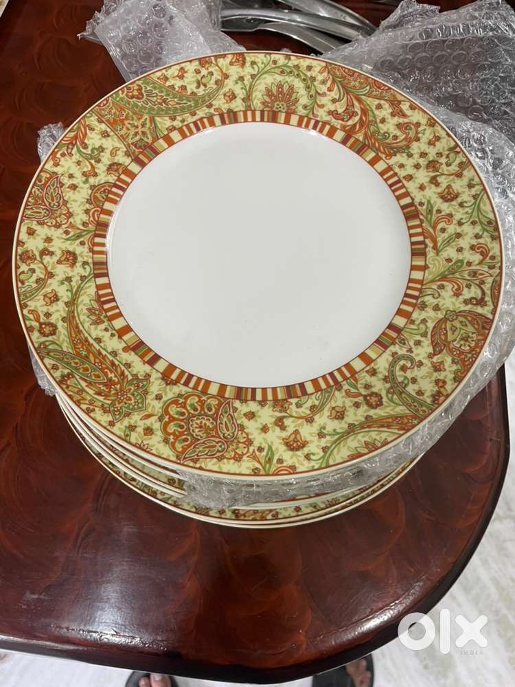 CERAMIC DESIGN PLATES SET OF 12 (negotiable)