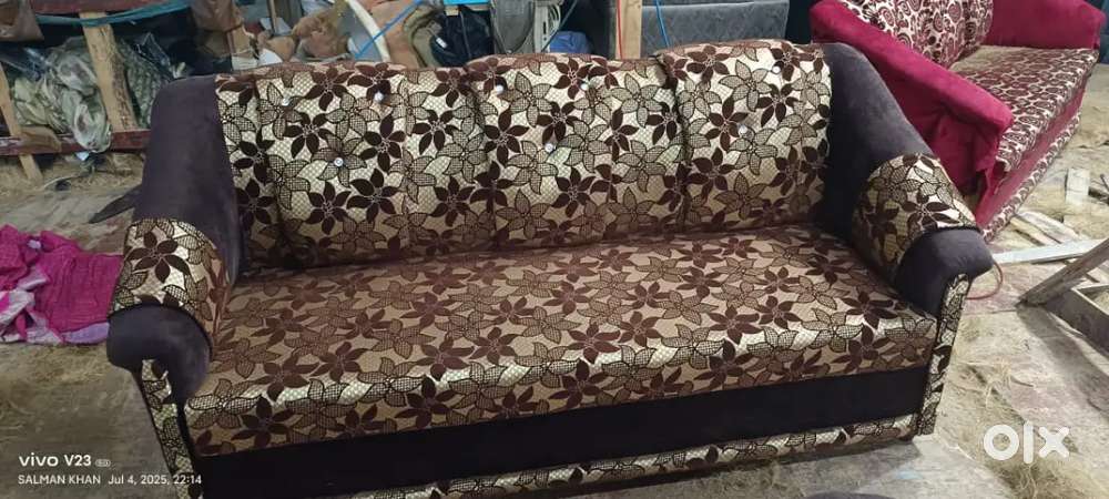 3 seater sofa with comfortable headrest and attached pillows
