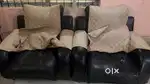 Black Sofa with Cream Cover
