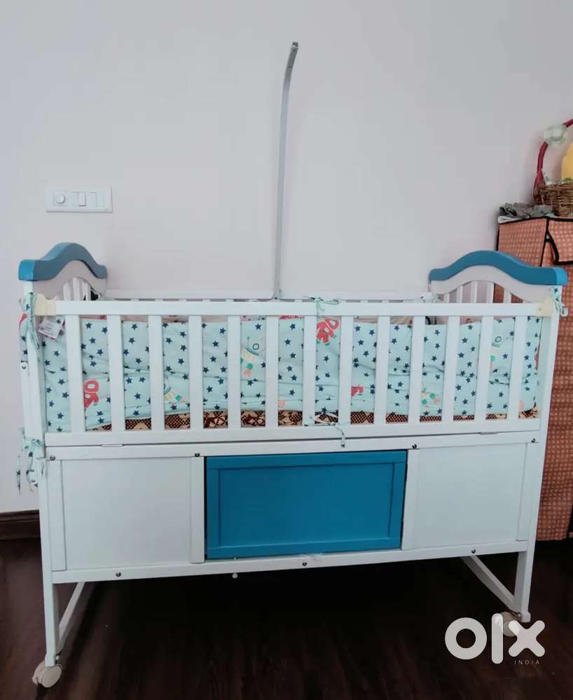 Baby Cot with storage for sale