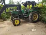 Sweeping machine with tractor