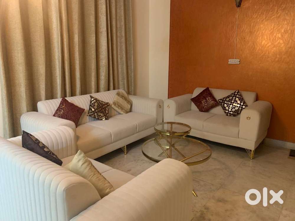 Brand new 3 seater off white sofa set , centre table curtains