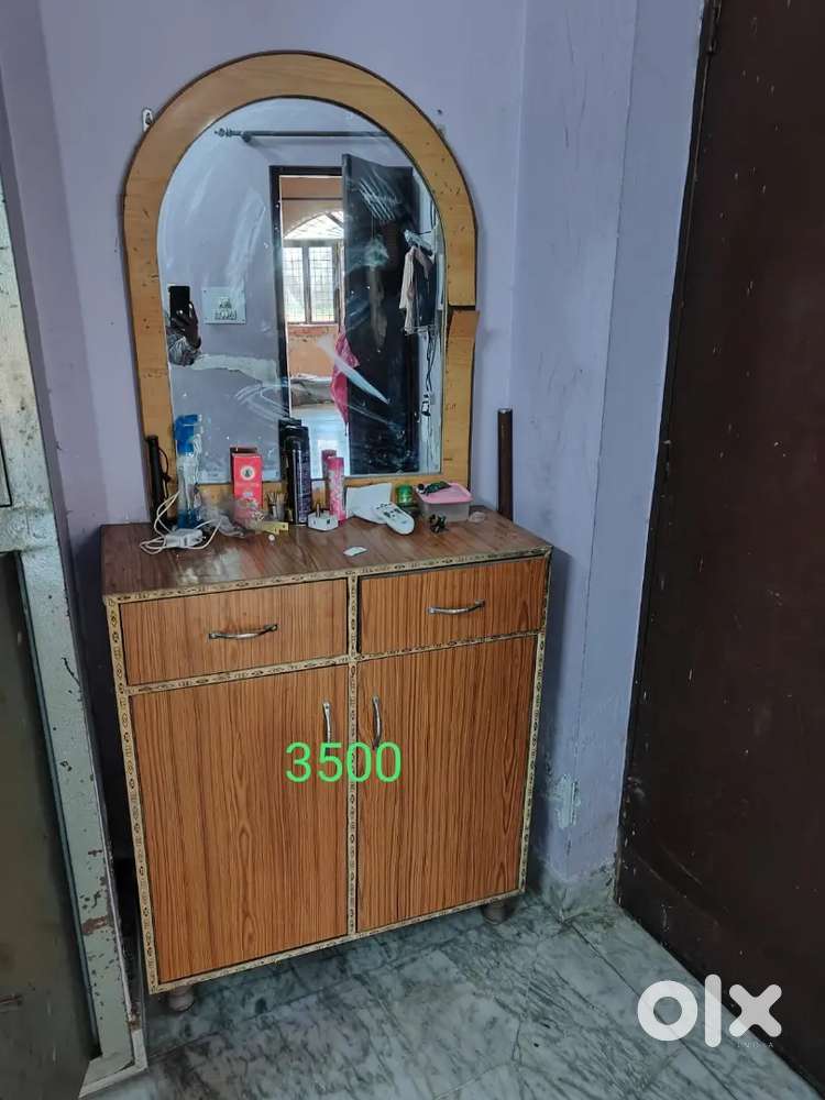 Dressing table with cup board