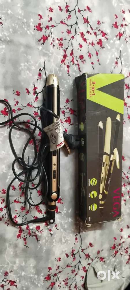 Hair straightener good condition less used by us 3 in 1