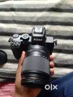 Nikon z50 & canon m50 price 1,50,000