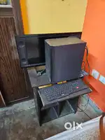 Desktop computer set with wooden table