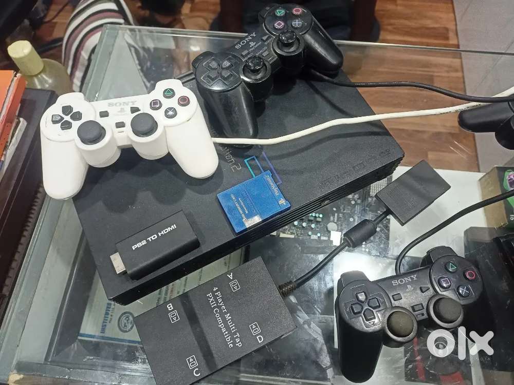 Ps2 with multiple tap wireless remote memory card hard disk etc