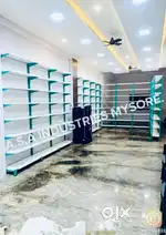 Medical shop interior metal racks manufacturer. ASA INDUSTRIES MYSURU